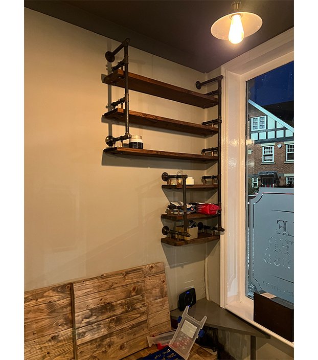 Bespoke shelving and reclaimed timber inside Little Chester Ale House