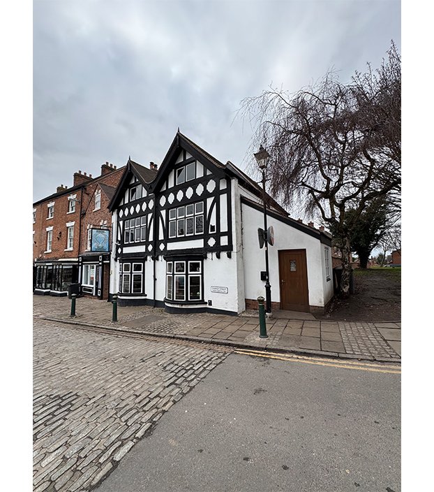 Historic exterior of The Angel pub in Atherstone